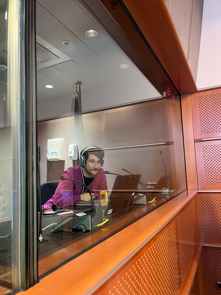 Mykhailo Khokhlovych inside the interpretation booth